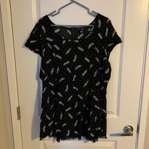 Black blouse with feathers and blue polka dots